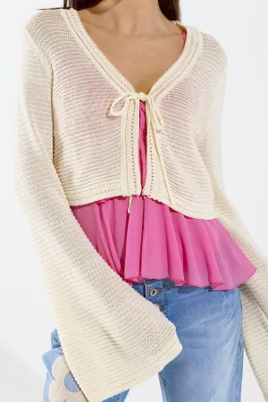 Long Bell Sleeve Knitted Cardigan in Cream With knot detail